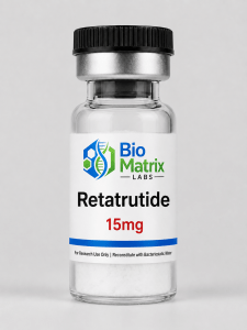 The image depicts a small glass vial containing a clear liquid, with a black cap and a white label featuring a logo, text,...