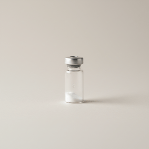 Professional e-commerce product photography of a **brandless** Acetyl Hexapeptide 8 Research Grade 2 mg Vial (A compact vial of acetyl hexapeptide 8 for cellular assays and peptide research.). The entire environment is a perfectly uniform, flat, solid color #EAE9E7 (light warm gray) with absolutely no gradient, vignette, spotlighting, texture, noise, or grain. The object is centered and tiny, occupying only 25% of the frame, surrounded by massive negative space. The background and floor are a seamless, infinite cyclorama of solid color #EAE9E7 with no horizon line, no corner, and no visible wall/floor transition. Lighting: ultra-even high-key with very strong global illumination and soft, multi-directional bounced fill (studio light tent look). Bright exposure (lifted midtones and shadows, low contrast), slightly overexposed overall while preserving product detail. Fully diffuse, no hard shadows, no cast shadows; at most a barely visible neutral contact shadow. No harsh specular highlights. Framing: simple 3/4 view. Perfectly centered. Style: ultra-clean, minimalistic. No logos, no text, no distractions. 8k resolution, sharp details on the object.